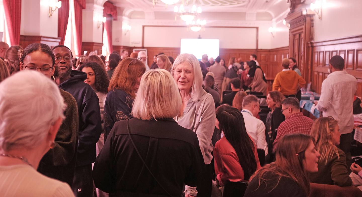 Attendees networking at 'Closing the Gap' event in February 2026 at Islington Town Hall