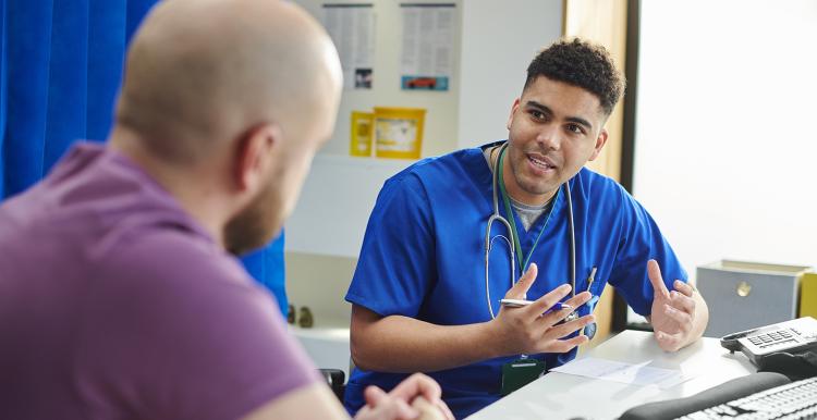 Man talking to a doctor