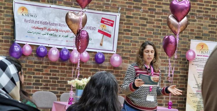 Gulum presenting to the Kurdish and Middle Eastern Women's Organisation