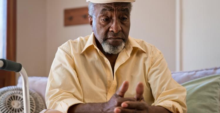 Black man deep in thought
