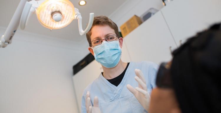 Dentist explaining treatment to patient