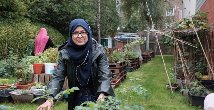 Bangladeshi woman enjoying gardening