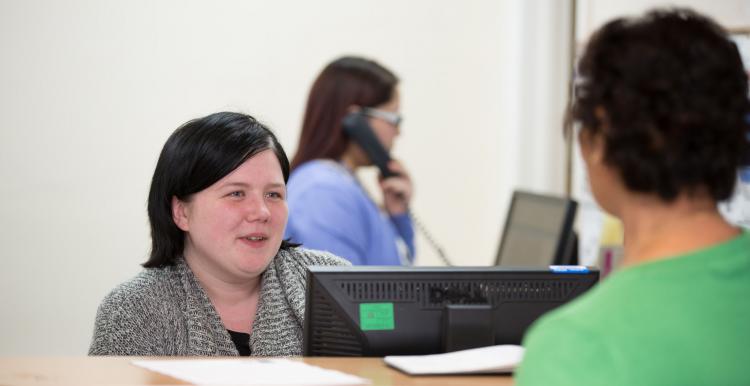 volunteer at a GP surgery