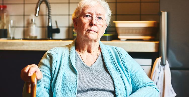 Elderly woman who uses patient transport services