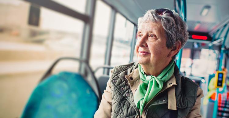 elderly lady travelling on the bus