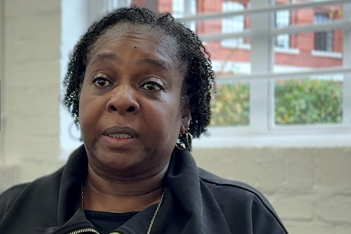 Woman talking in front of a recessed window