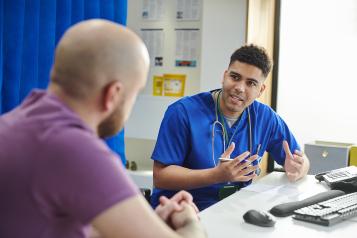 Man talking to a doctor