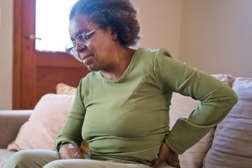 Elderly woman with health conditions at home