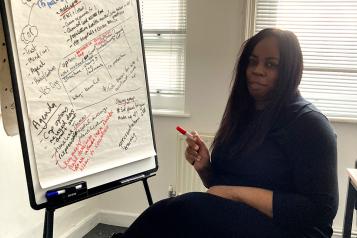 Deborah with a flipchart