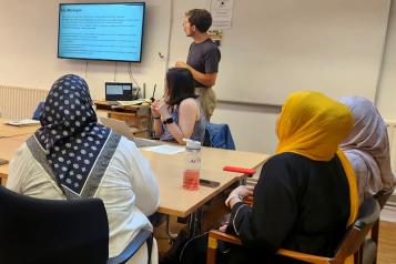 Women attend an NHS engagement event