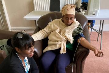 Blood pressure reading during a health check in a community setting