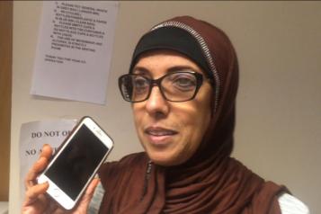 Lady in glasses and a headscarf