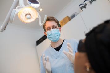 Dentist explaining treatment to patient