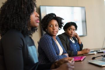 Women at a meeting