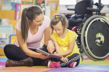 Young unpaid carer with disabled child