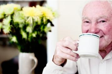 Older man with cup of tea