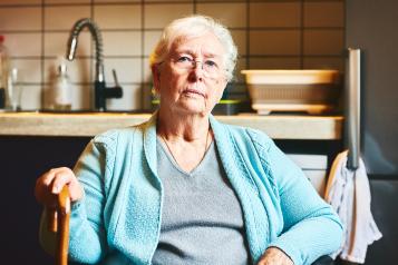 Elderly woman who uses patient transport services