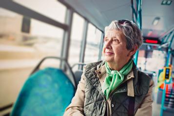 elderly lady travelling on the bus