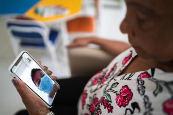 Patient talking to a doctor using mobile phone