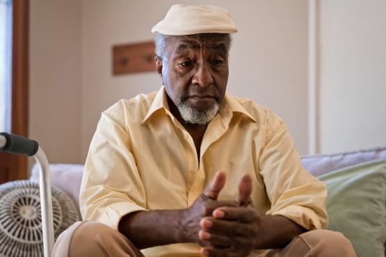Black man deep in thought