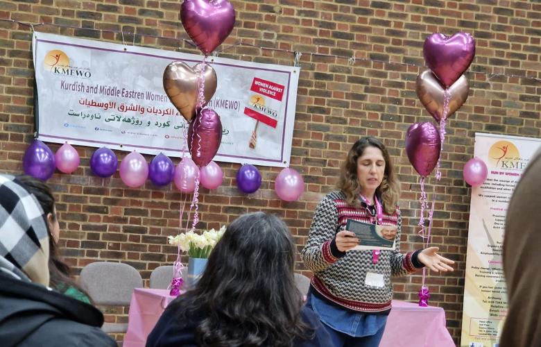 Gulum presenting to the Kurdish and Middle Eastern Women's Organisation