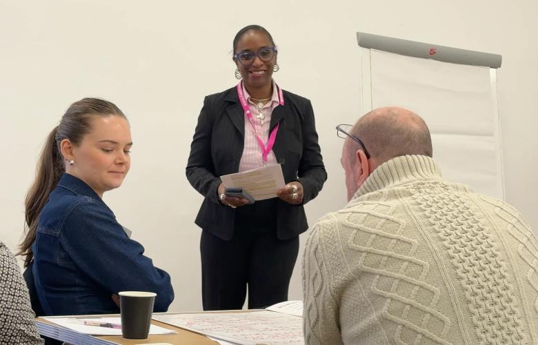 Professionals talking about ways to challenge inequality