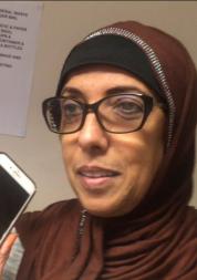 Lady in glasses and a headscarf