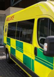 an ambulance parked outside a hospital